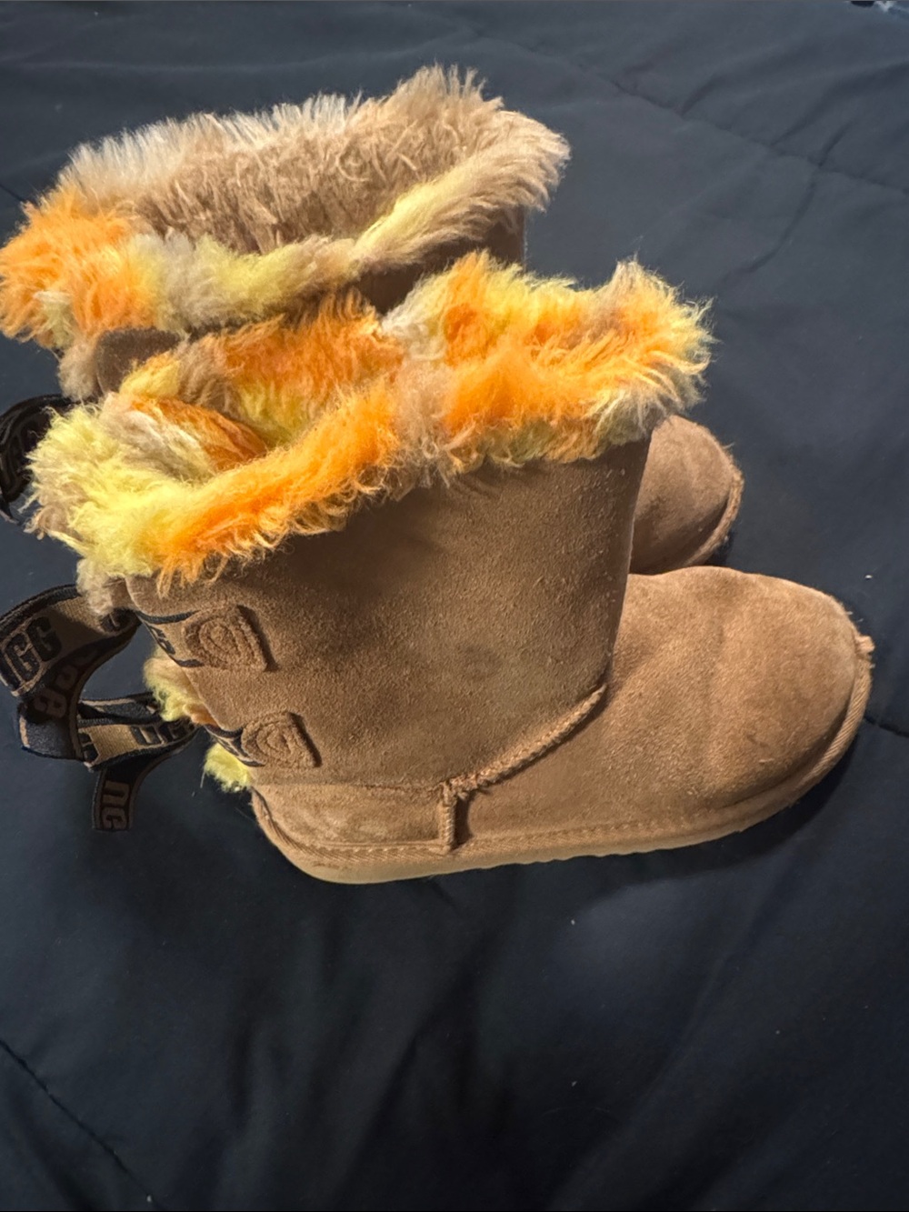 UGG Kids Brown Suede Boots with Yellow and Orange Faux Fur Trim